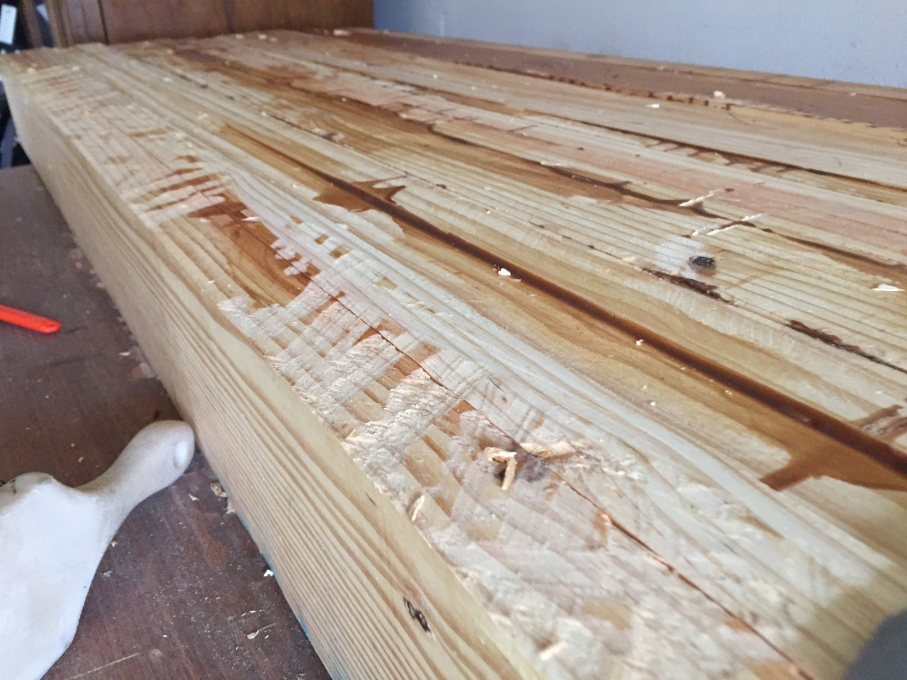 Laminated pine bench top, rough, uneven and lots of dried glue